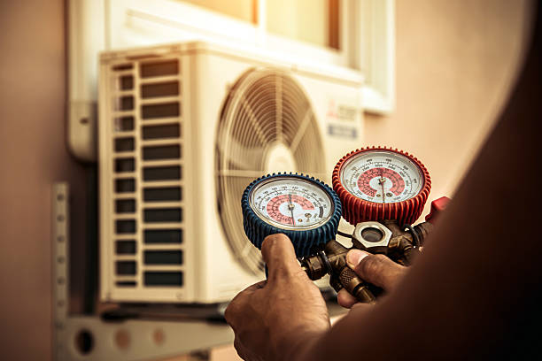 Professional Air Conditioning Service technician working in Millstone Township, NJ